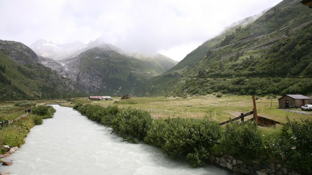 Upper reaches of the Rhone river, Rhone glacier and Furka mountain pass in the background.