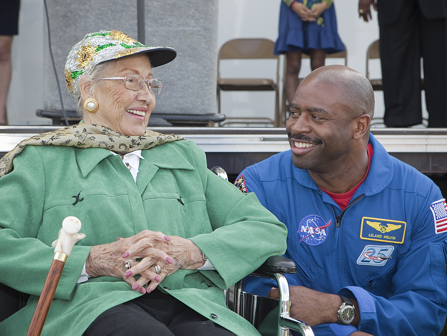 Mathematician Katherine Johnson speaks with astronaut Leland Melvin.