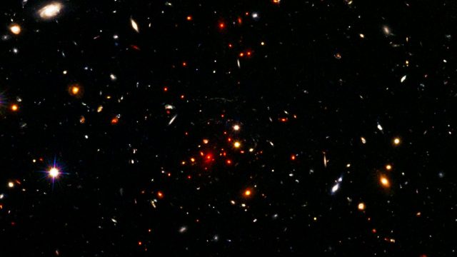 An image of a cluster of galaxies, meaning science.