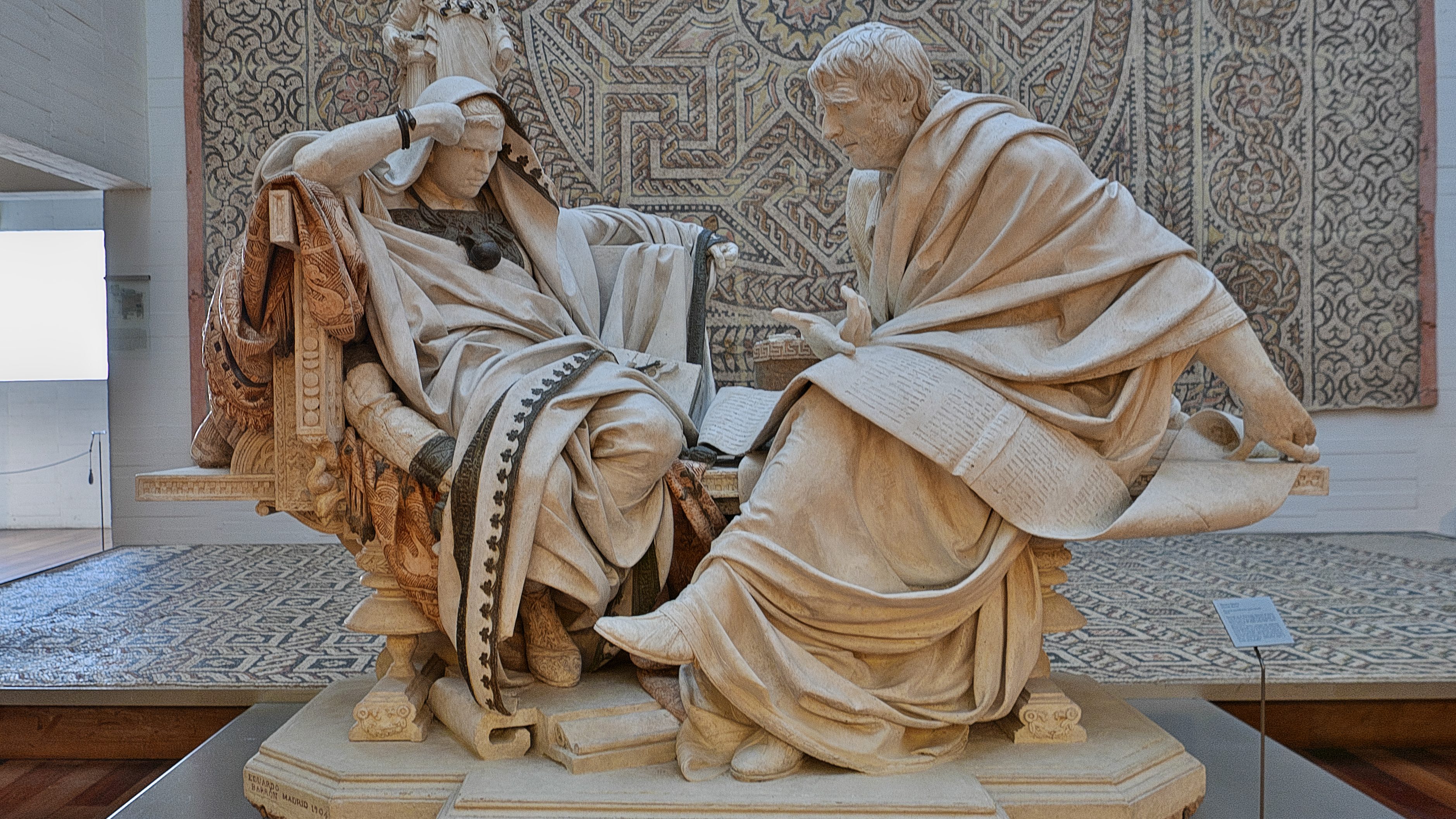 A plaster casting of Seneca and his student Nero in the presence of Minerva.