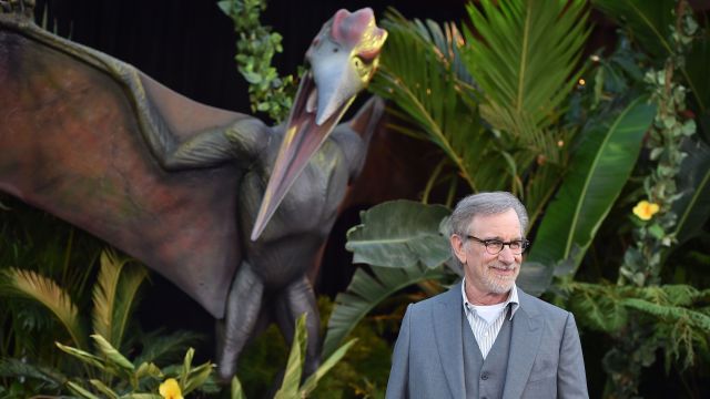 Steven Spielberg in front of a pterodactyl