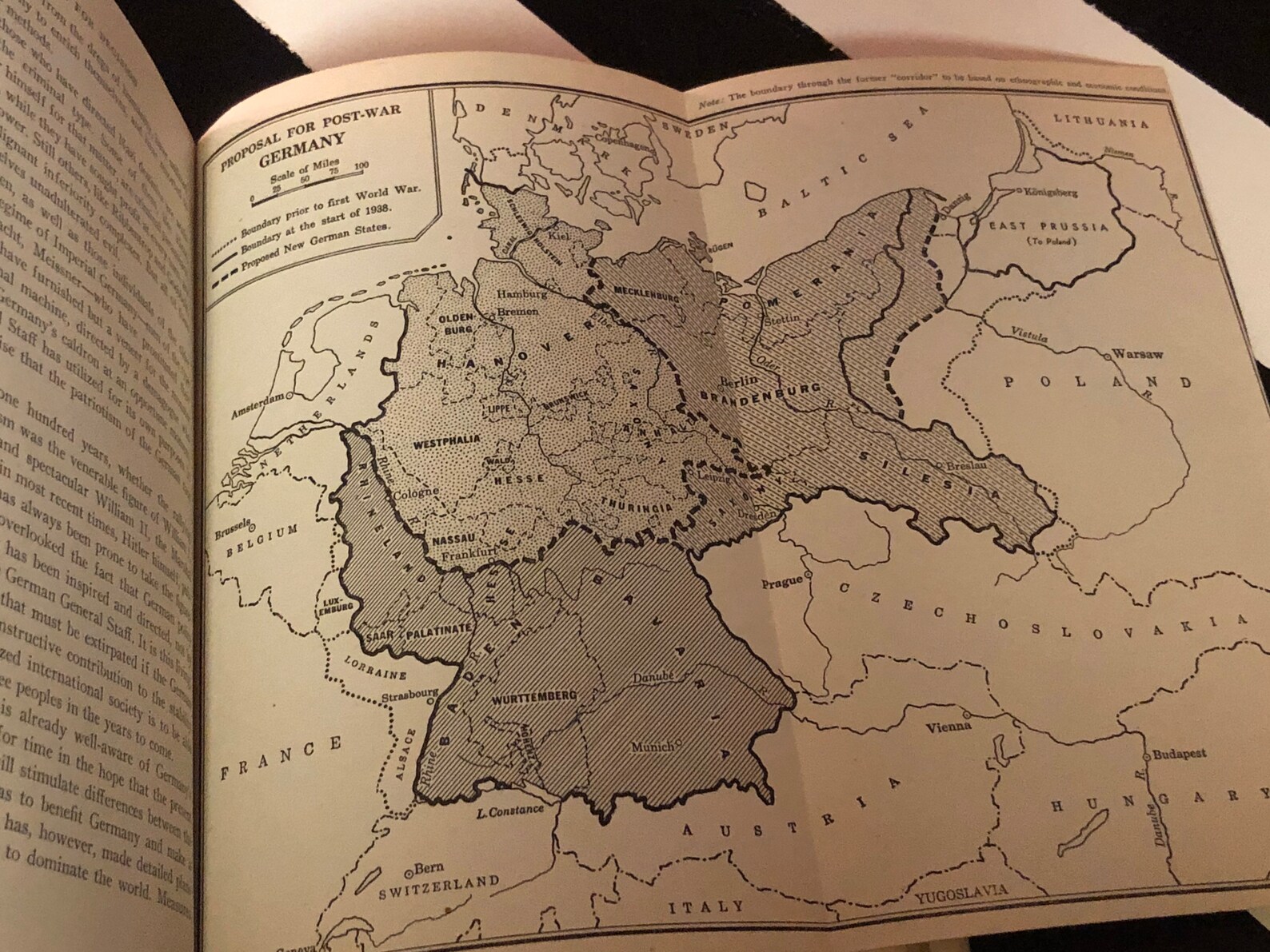 an open book showing a map of germany.