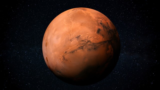 a red planet with stars in the background.