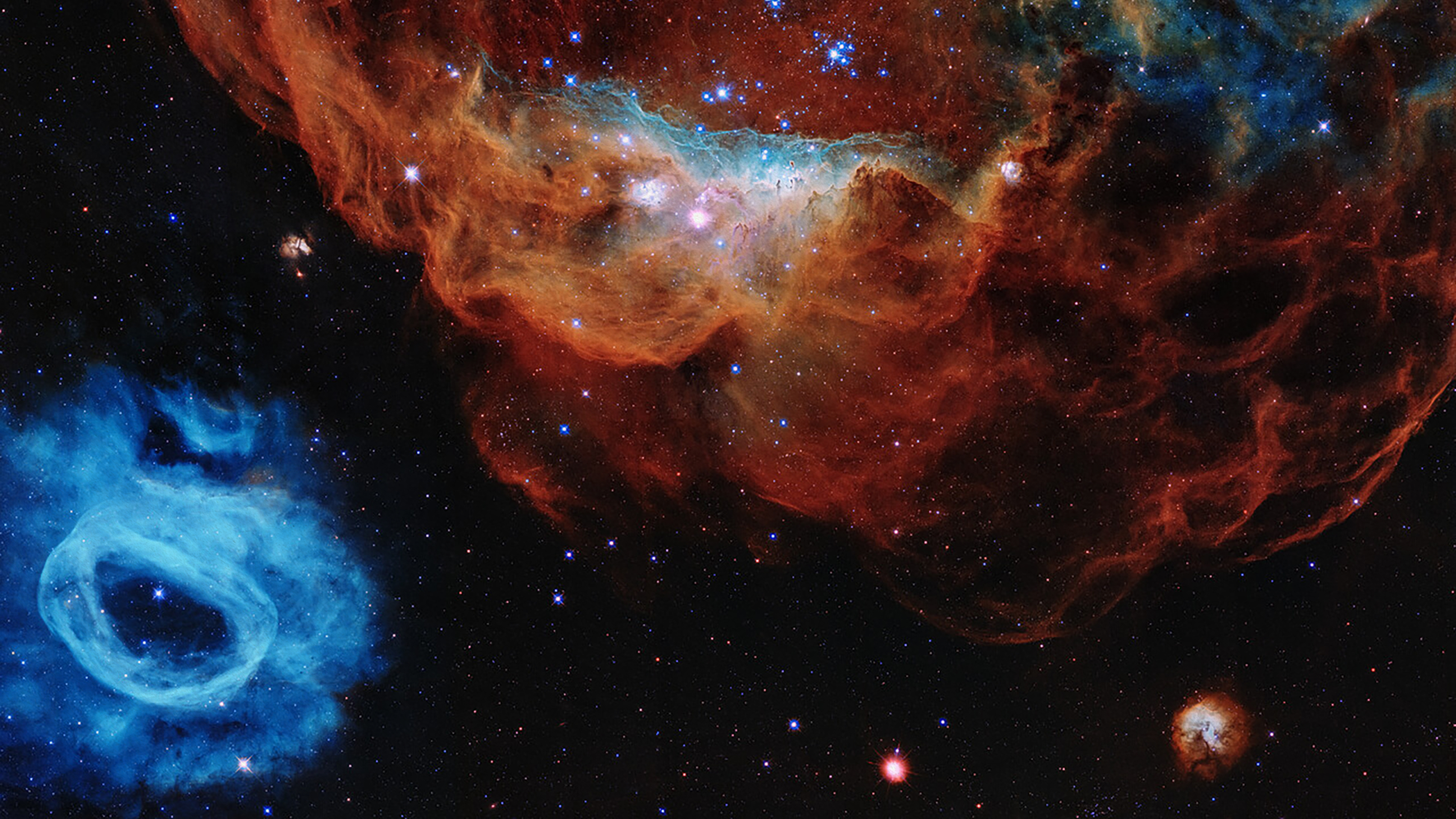a close up of two stars in the sky.
