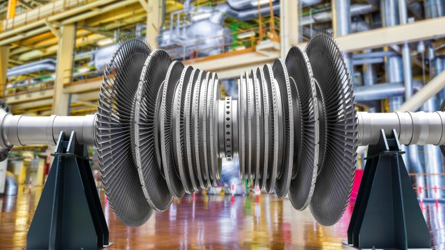 a large industrial turbine in a factory.