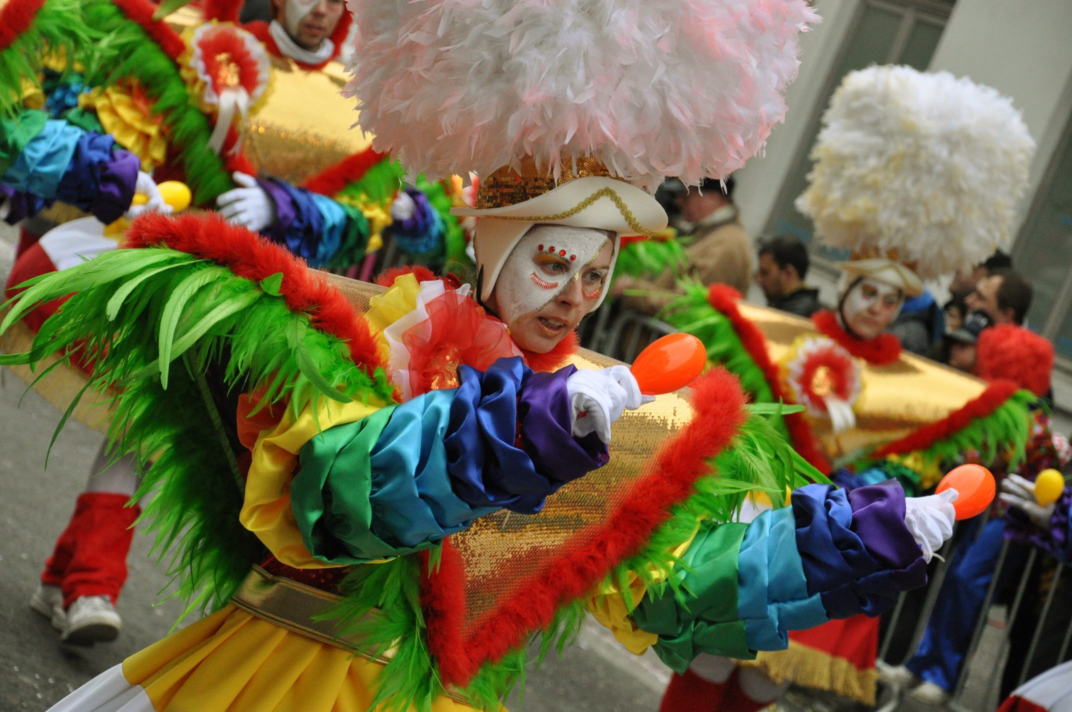 A group of people dancing in colorful costumes.