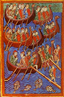 A picture of men in boats on the water.
