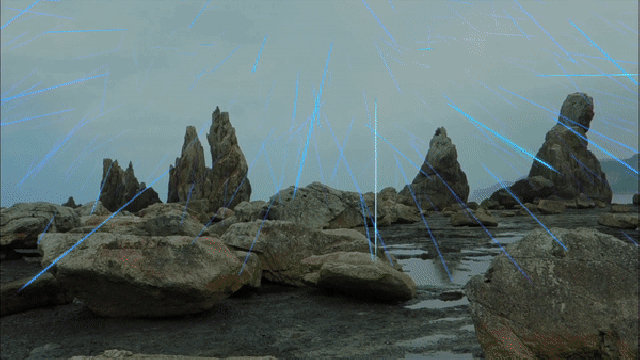 a group of rocks with blue light coming from them.