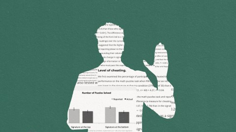 A silhouette of a man holding up a newspaper, inspired by Dan Ariely.