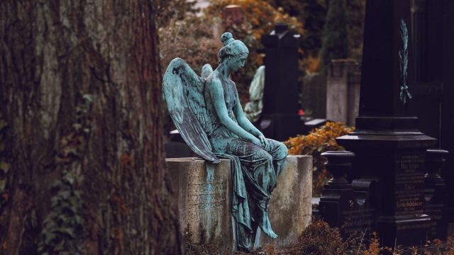 A cemetery statue of an angel.