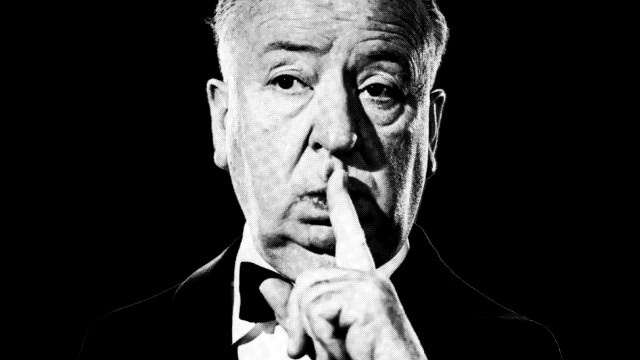 A black and white photo depicting a man with a mysterious expression, reminiscent of Alfred Hitchcock.