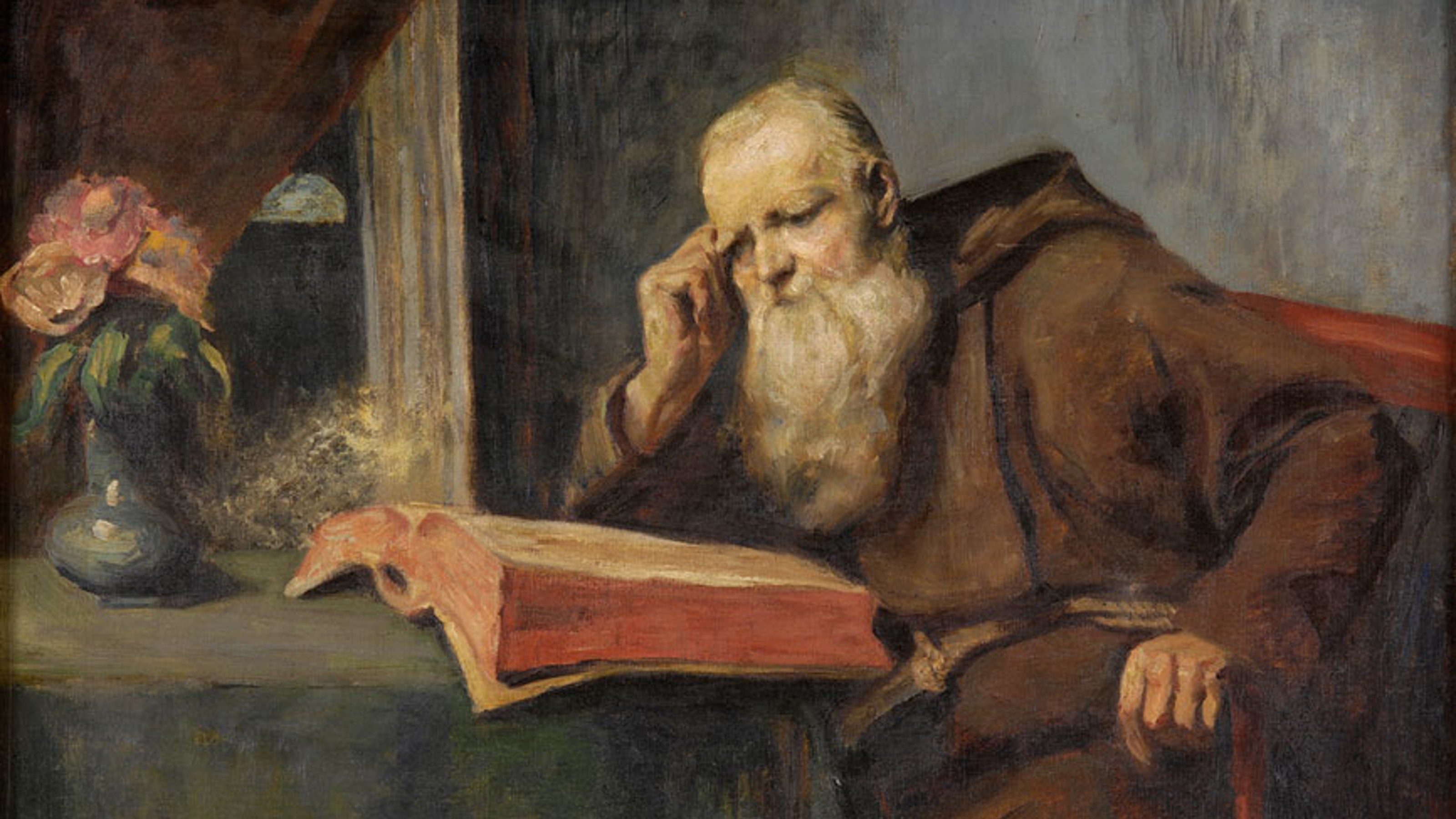 A painting of a monk reading a book.