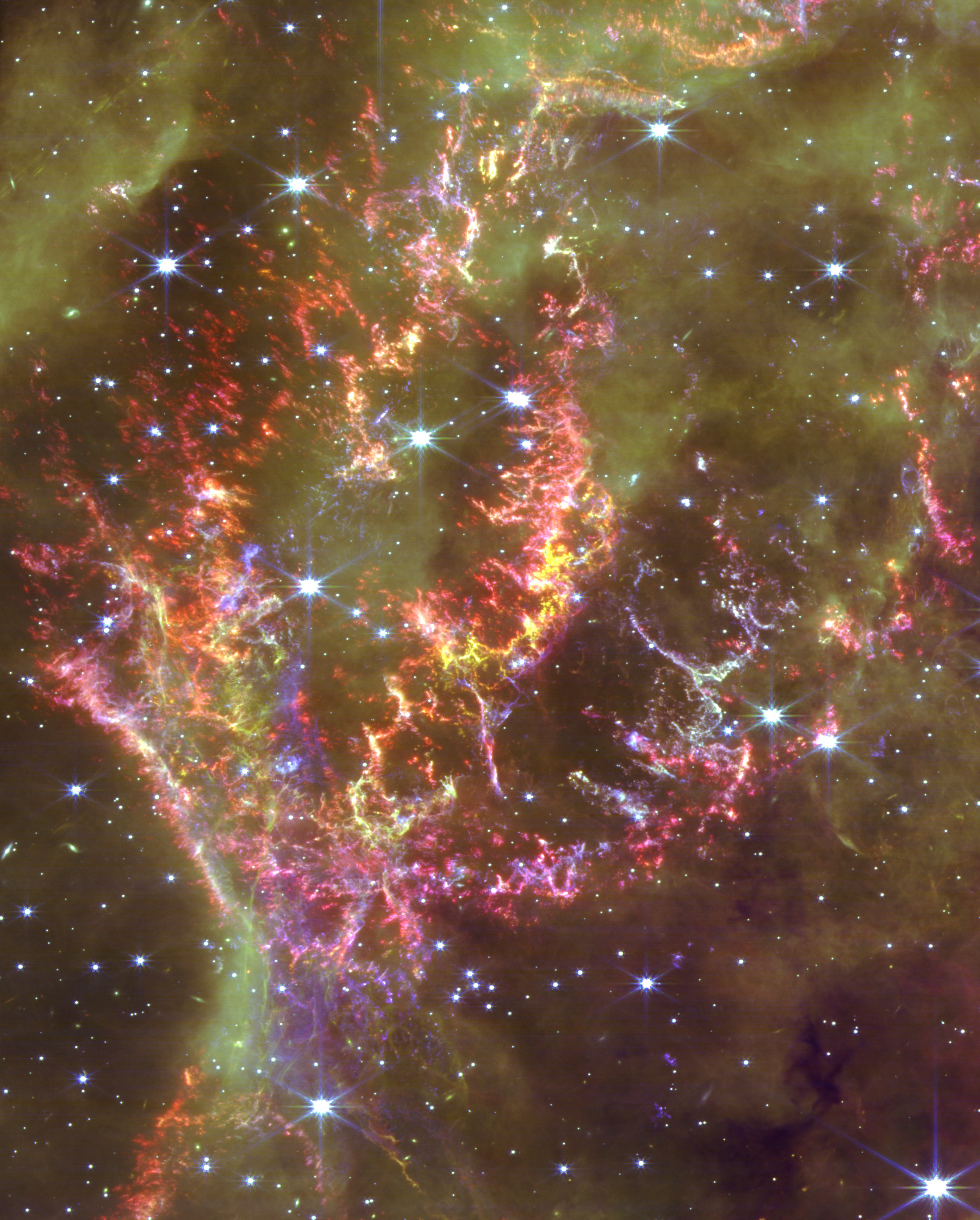 NASA image of JWST Cas A, a supernova remnant showcasing stars and nebulae.