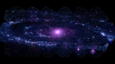 An image of a purple galaxy in space.