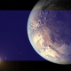 An image of a planet with a moon, highlighting one of the first living worlds discovered.