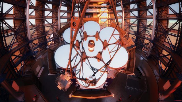 An image of the future of US astronomy with a large telescope inside a building.