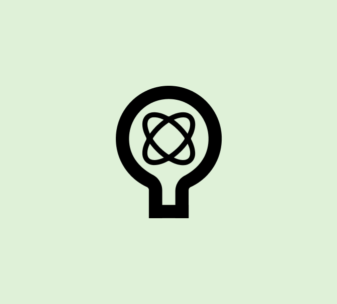 A black light bulb icon with an atomic nucleus symbol inside it on a green background.
