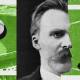 A black and white portrait of a man with a large mustache is overlaid on a green collage containing a baseball and a baseball field, subtly evoking the philosophy of hindsight.