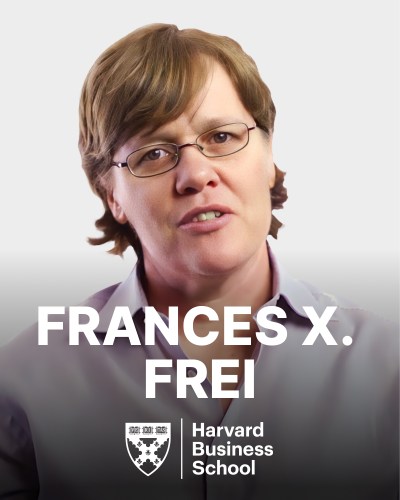 A woman with short hair and glasses, identified as Frances X. Frei, is pictured with the Harvard Business School logo below her name.