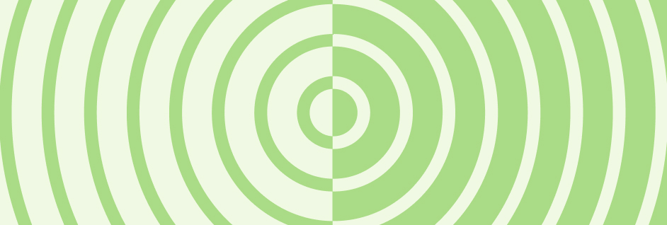 A pattern of concentric circles in various shades of green, split vertically at the center, creating a symmetrical design.