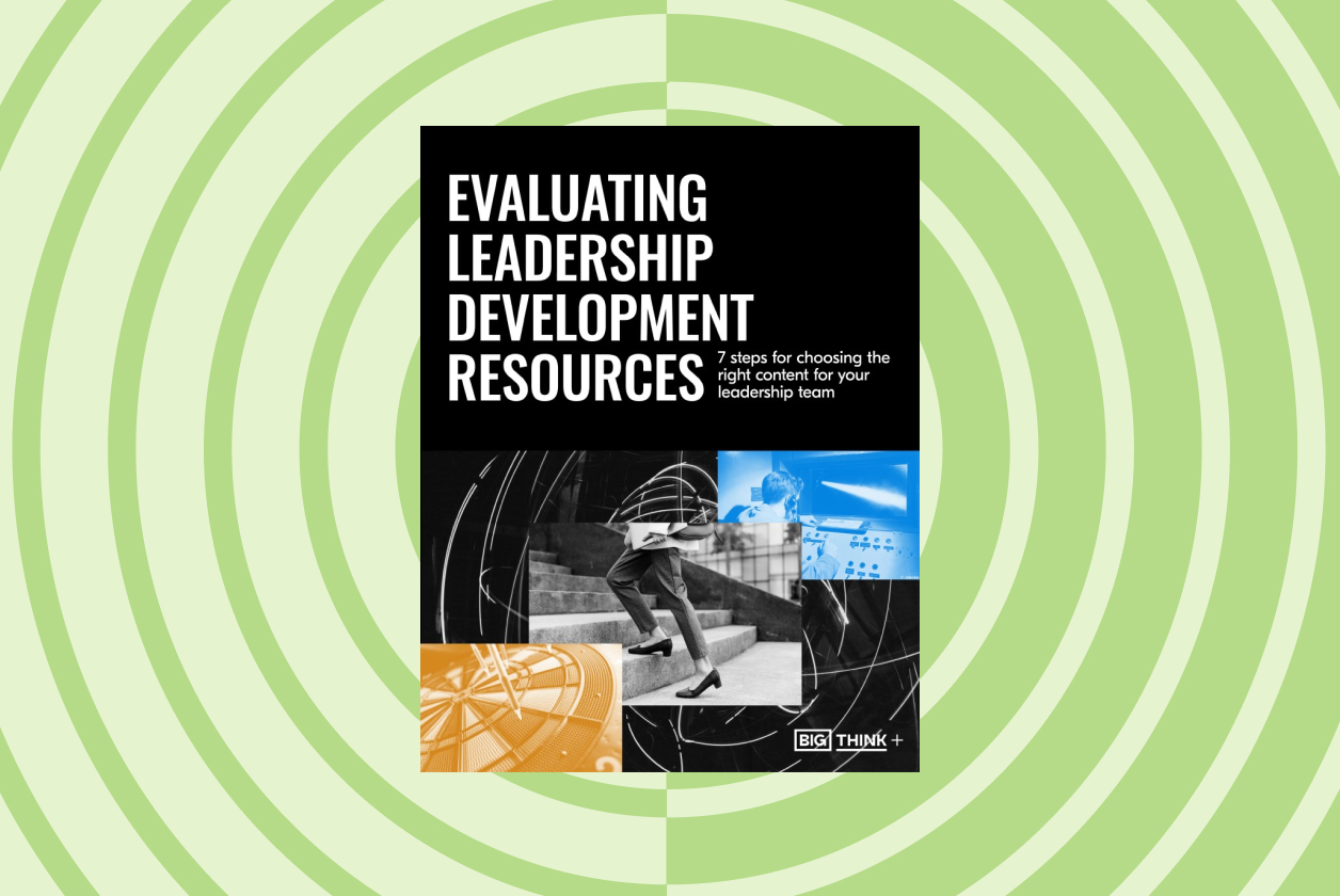 Cover of a guide titled "Evaluating Leadership Development Resources" by Big Think+. Features abstract design with a person climbing stairs and geometric shapes in black, white, and orange.