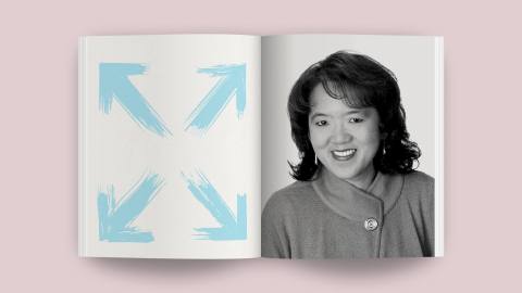 An open book shows a portrait of a smiling woman on the right page and four blue arrows pointing outward on the left, leading your eyes to something bigger beyond its pages.