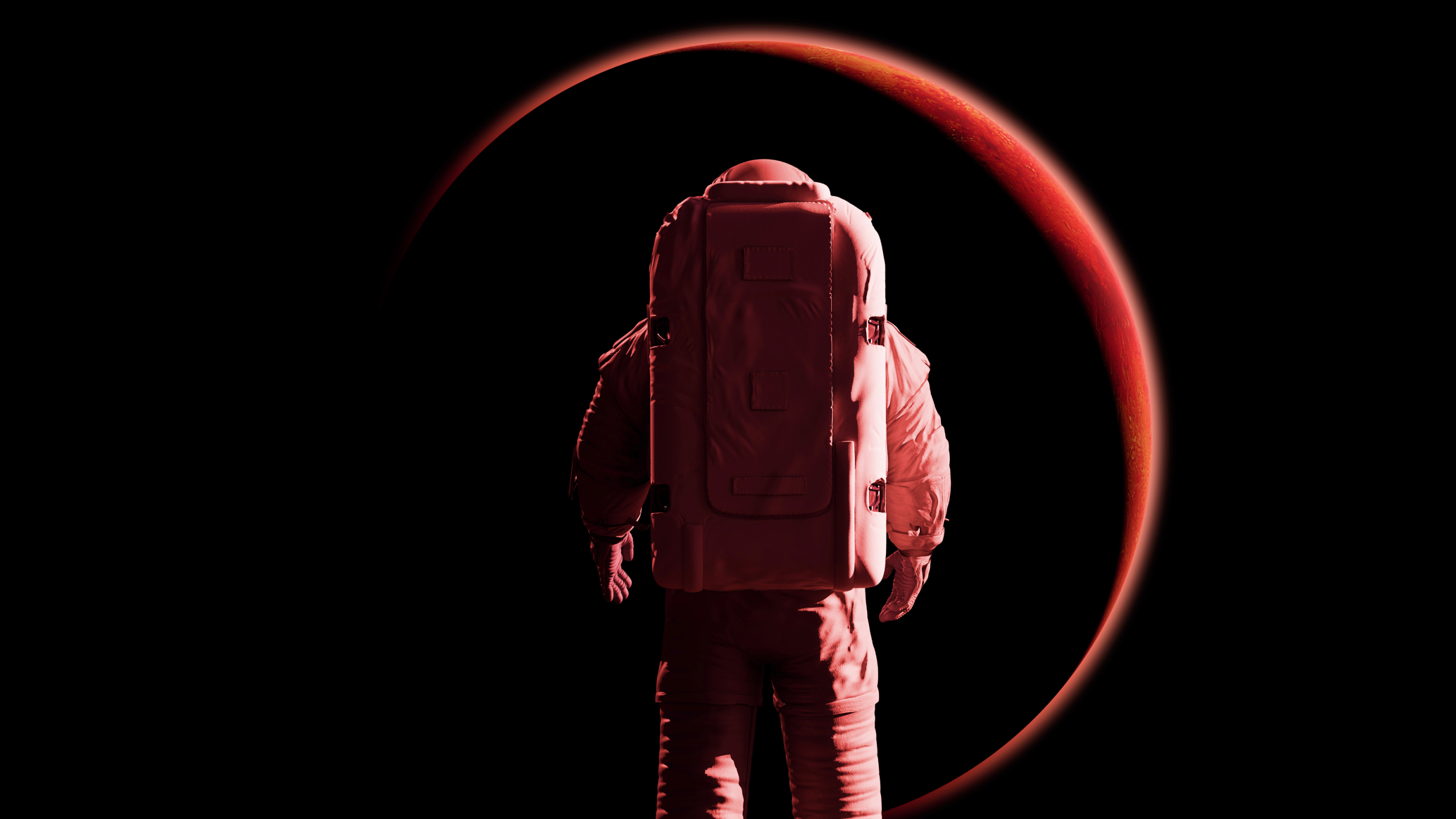 An astronaut in a spacesuit stands facing a large red planet or celestial body with a glowing edge against a black background.