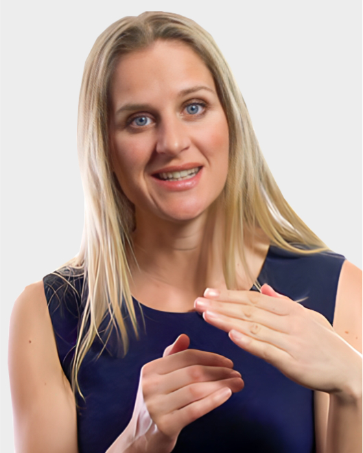 A woman with long blonde hair, wearing a dark sleeveless top, gestures with her hands while smiling and looking forward.